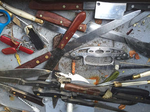 Supporting image for story: 150 knives, guns and knuckle-dusters handed into West Midlands Police weapons amnesty