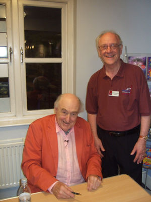 Henry Blofeld with festival centre chairman Geoff Vernon