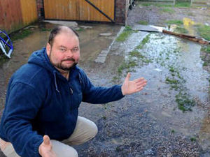 Supporting image for story: Sewage pipe floods driveway