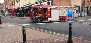 Fire crews could be seen at the site hours after the fire