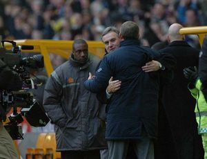 Dave Jones gets a hug from Sir Alex Ferguson at full time.