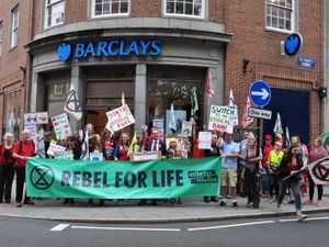 Supporting image for story: Shrewsbury activists take over town centre bank in protest