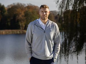 Andrew 'Freddie' Flintoff by a lake