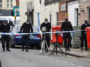 Supporting image for story: Police scour scene as double Bearwood shooting leaves two men in hospital