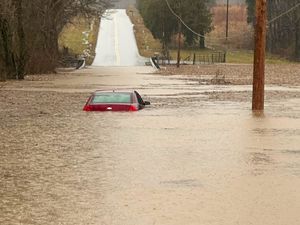 Supporting image for story: Flooding leaves two dead in Kentucky as snow and ice cause misery elsewhere