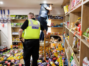 Supporting image for story: Illegal tobacco hidden in 'intricate' hiding spot uncovered in police shop raids