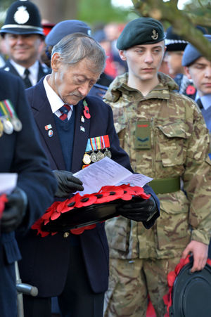 A veteran prepares to lay his wreath in Bridgnorth