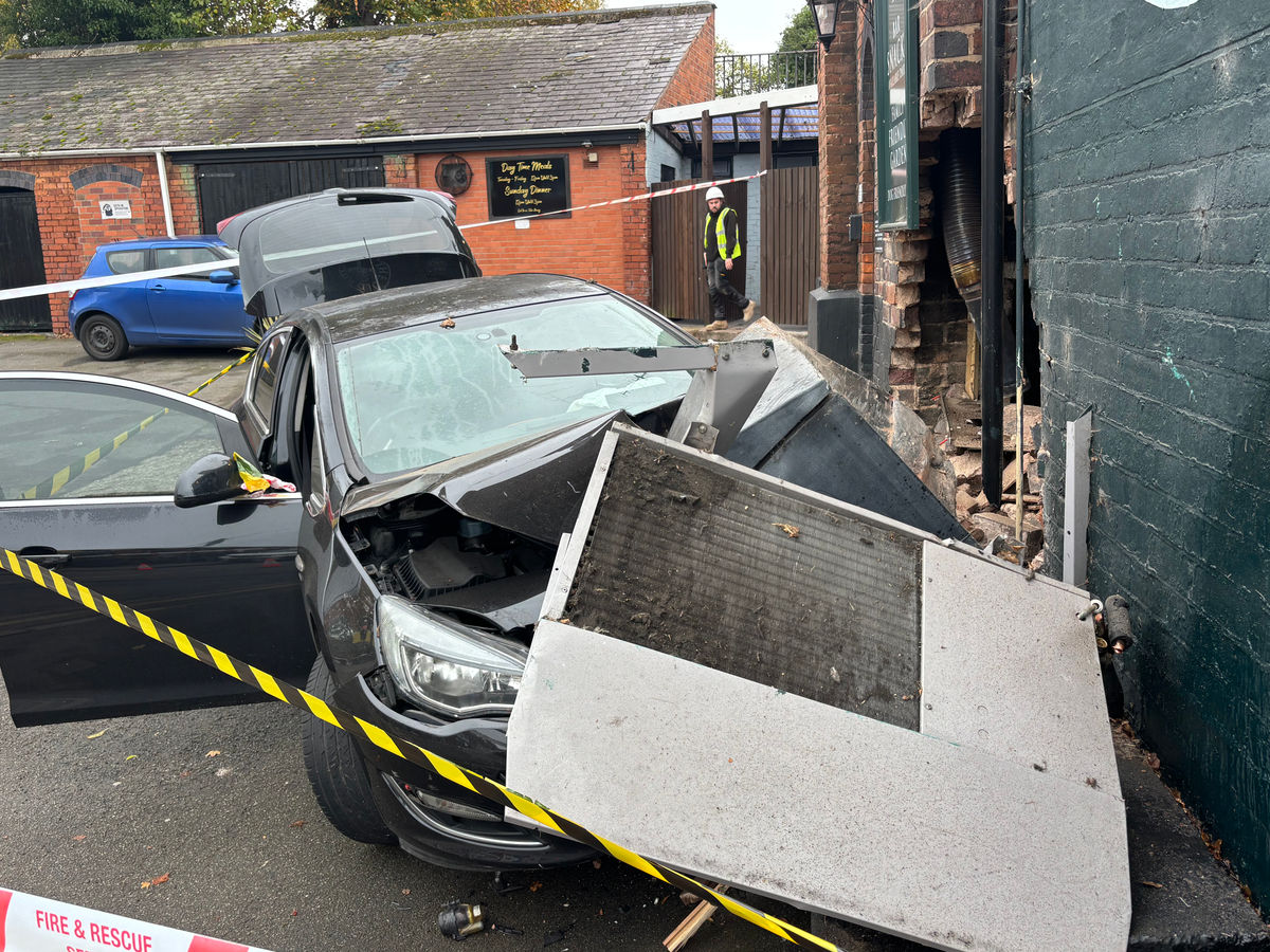 The wood burner is now behind the bar: Structural investigation and road closure as car ploughs into 300-year-old pub in village near Dudley