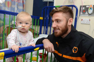 Ten month old Amelia Goodger meets James Henry on the Children's Ward