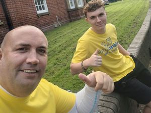 Supporting image for story: Father and son trek nearly 30 miles for charity to watch their beloved Leicester City at West Bromwich Albion