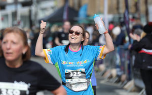 All the joy of crossing the line for this competitor in the Welshpool 10K Run. Photo: Phil Blagg Photography