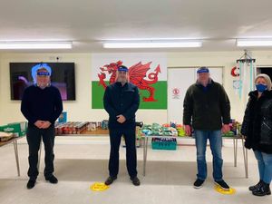 Supporting image for story: MP and daughter lend a hand at foodbank