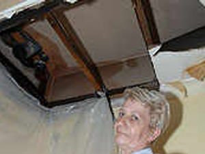 Supporting image for story: Roof caves in on residents