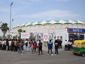 Fans gather outside Atal Bihari Vajpayee Ekana Cricket Stadium after organisers suspended the Indian Premier League for one week