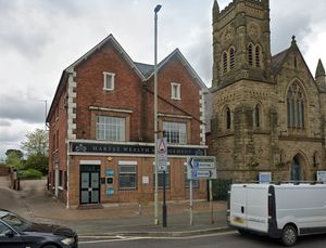 A proposal to turn three homes into 12 flats and bedsits at the site occupied by Hartey Wealth Management in Oswestry has been withdrawn. Picture: Google