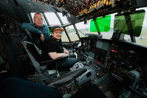 Stuart Maxwell and son Adam inside a Lockheed Hercules C130K Mk3