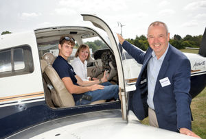 Linda Grocott and Paul Latham pictured with Archie Holland