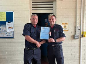 Supporting image for story: School caretaker hangs up his firefighter's helmet after 18 and a half years