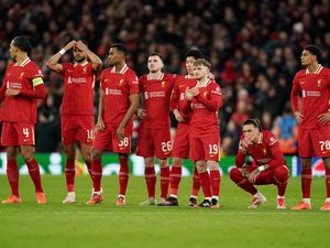 Darwin Nunez, second right, and Liverpool react during the penalty shoot-out defeat to Paris St Germain