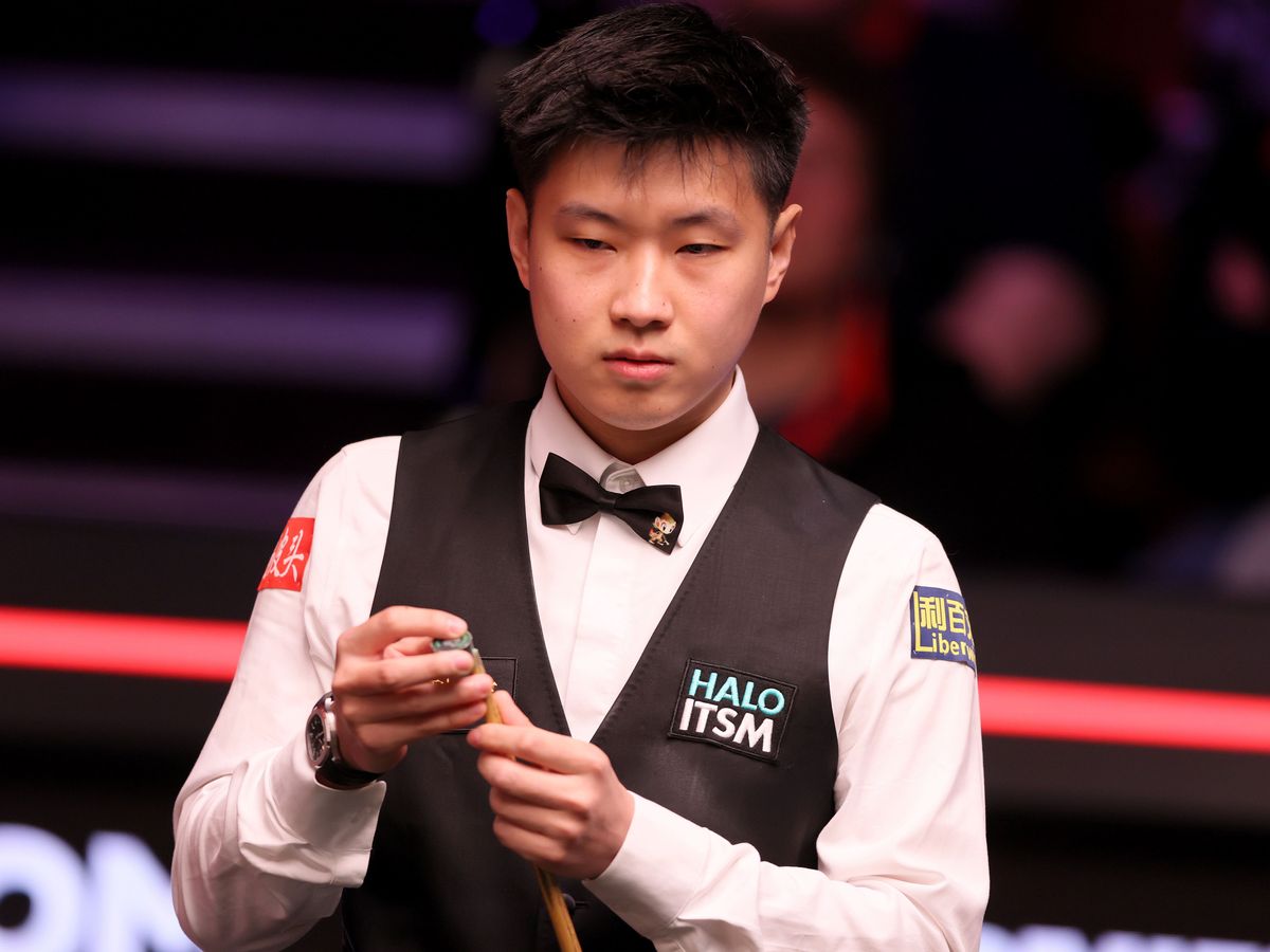 Xiao Guodong and Zhao Xintong continue Chinese charge at World Championship