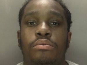 Supporting image for story: Man jailed after police found knife in bag that he threw over bridge onto train at New Street Station