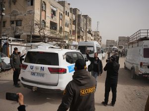 Supporting image for story: Palestinians line up at border after reopening of Rafah crossing hit by delays