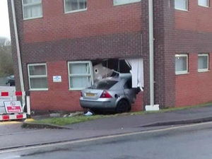 Supporting image for story: Cannock road closed for hours as car smashes into building causing gas leak