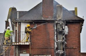 Firefighters dealing with the blaze at Kay's Lounge