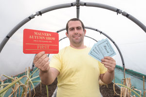 Chris with some of his prizes from previous shows