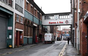 The signs on the building will remain under the plans