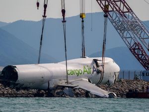 Supporting image for story: Main wreckage recovered from sea after cargo plane crash