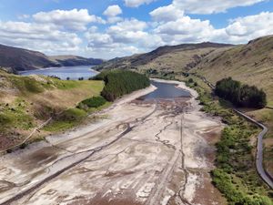 A view of Haweswater reservoir in Mardale, Cumbria, in late May, with extremely low water levels