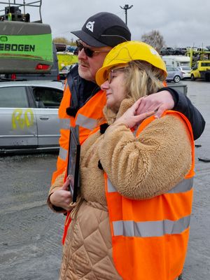 Damian and Lynette Corfield watch the car be crushed