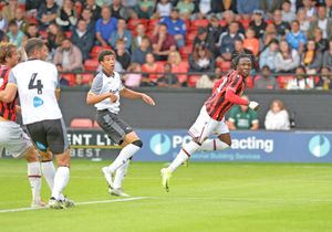 Vincent Harper gives Walsall the lead with an 11th minute header.