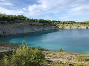 Supporting image for story: Two rescued as 60 people gather at disused 'blue lagoon' quarry pool