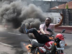 Supporting image for story: Protesters attack embassies in Congo’s capital as security forces slow rebels