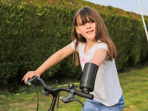 Supporting image for story: Watch: Eight-year-old Telford girl giggles with delight as she test-drives new £20,000 bionic arm