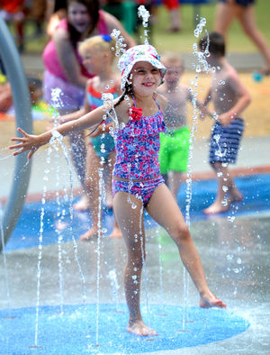 Mia Clarke, aged 7, has fun in the play area at Walsall Arboretum