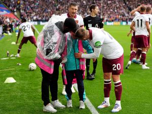 Supporting image for story: West Ham duo free ball boy from under collapsed hoarding amid fan celebrations