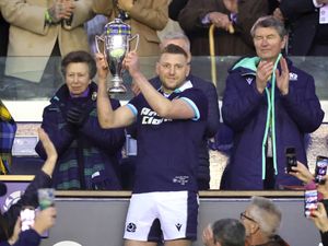 Finn Russell with the Doddie Weir Cup