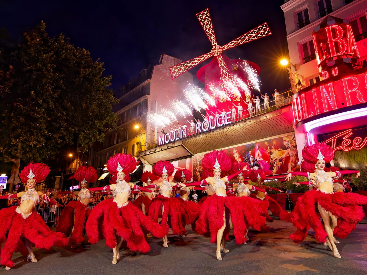 Moulin Rouge’s windmill sails turn again after restoration