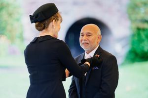 Sufu 'George' Miah accepts his medal