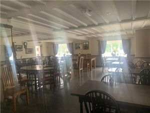 The main room has a lot of room for guests. Photo: Halls Commercial