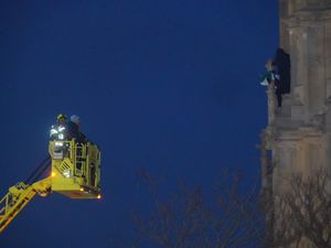 A protester on the Elizabeth Tower