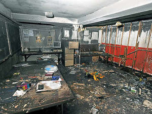 Supporting image for story: Community rallies round fire-hit club