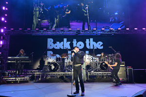 British singer Dominic Harrison, known as Yungblud and his band during rehearsals on the eve of British rock band, Black Sabbath's "Back to the Beginning" concert, Ozzy Osbourne's final ever gig as Black Sabbath's frontman at Villa Park in Birmingham, central England on July 4, 2025. Osbourne, who revealed in 2020 that he has Parkinson's disease, will join Tony Iommi, Geezer Butler and Bill Ward for the all-day "Back To The Beginning" show in Birmingham, central England, where the heavy metal giants formed in 1968. (Photo by ANDY BUCHANAN / AFP) (Photo by ANDY BUCHANAN/AFP via Getty Images)          