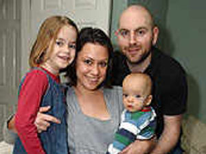 Supporting image for story: First birthday for miracle baby George