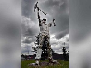 Supporting image for story: Miners statue wrapped up in bandages as part of appeal