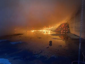 Supporting image for story: Up to 30 firefighters tackle biomass barn blaze near Market Drayton