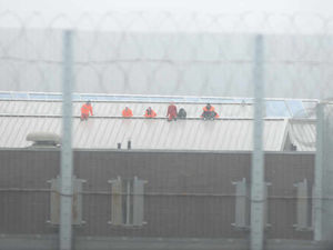 Supporting image for story: Prisoners protest on roof at HMP Oakwood